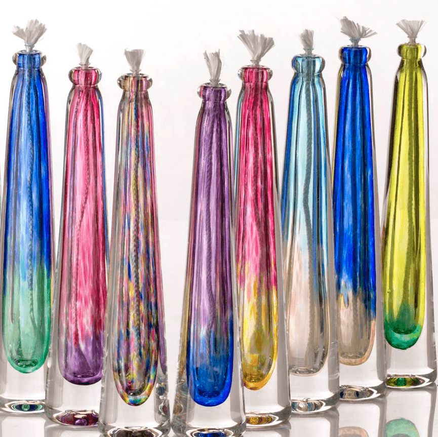 8 glass oil lamps in various colors