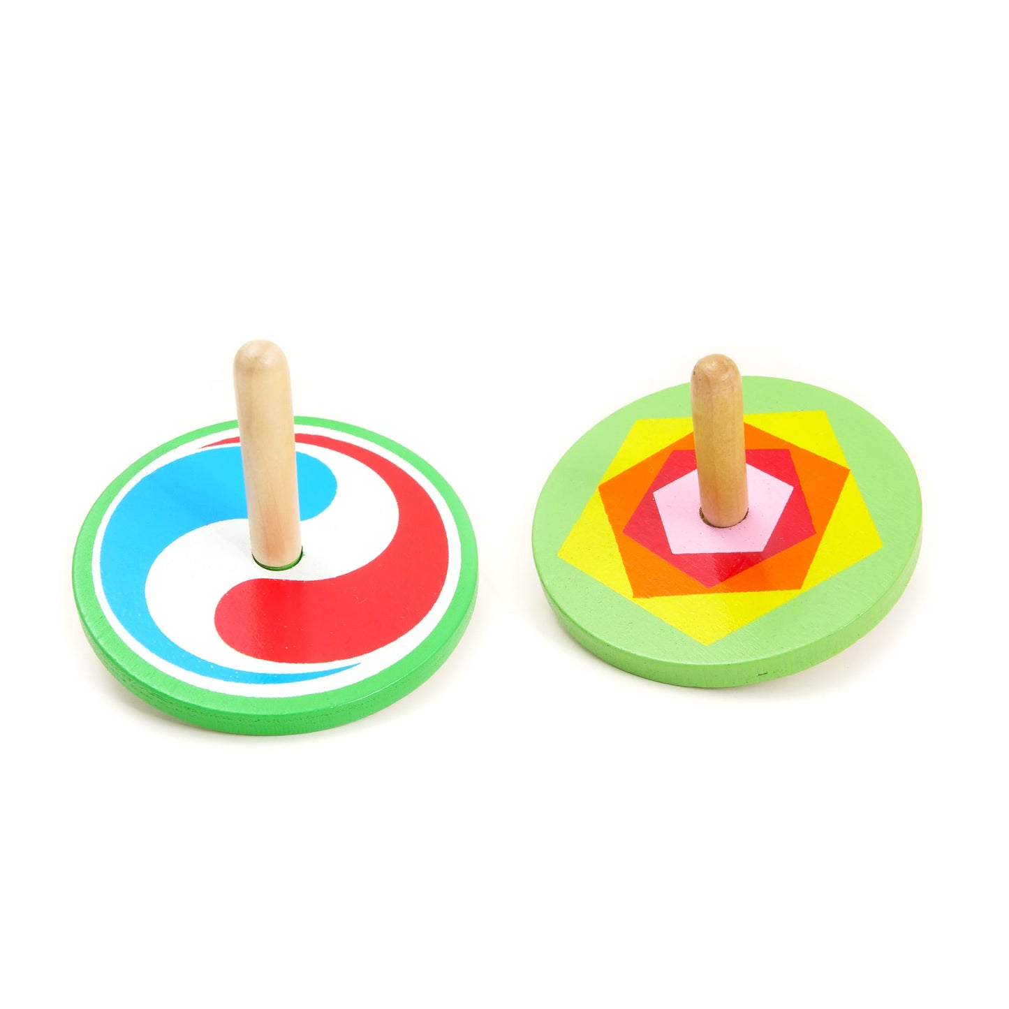 Two colorful wooden spinning tops on a white background