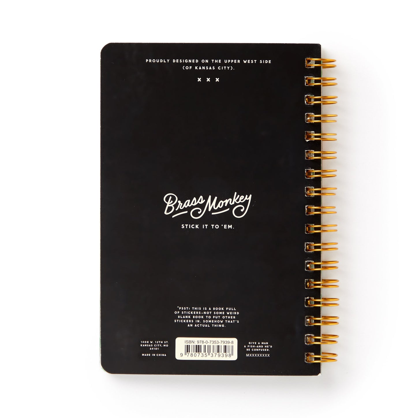Black notebook with gold spiral binding and 'Brass Monkey' branding on a white background