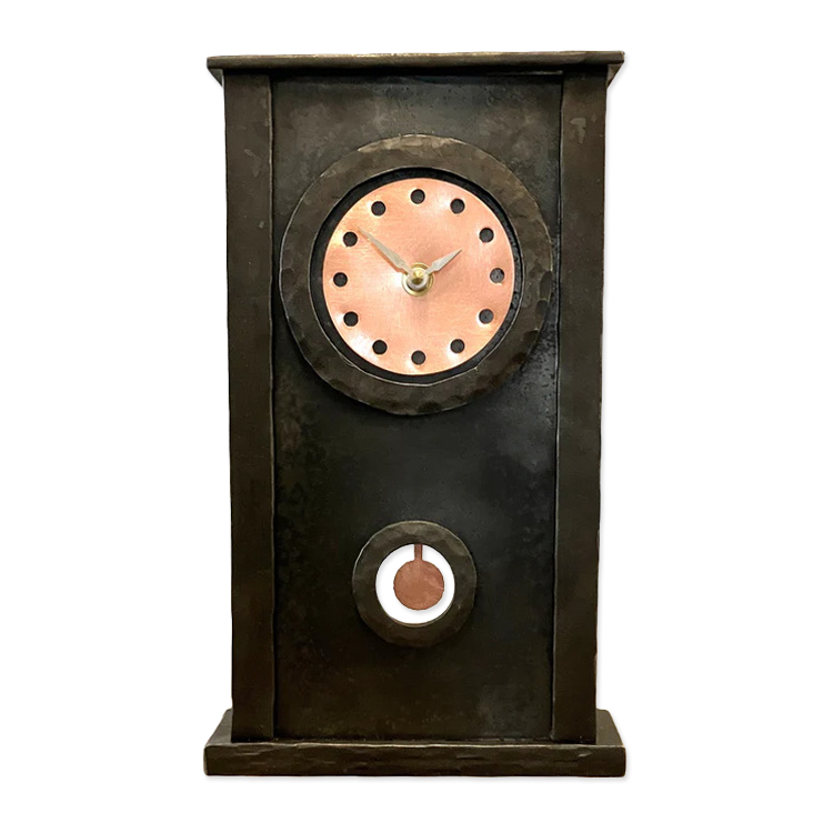 Decorative clock with a metallic finish on a white background