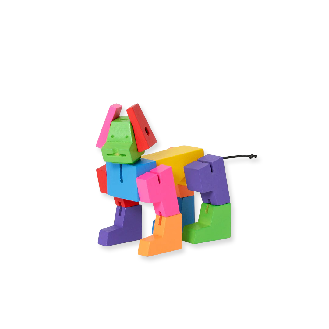 Colorful toy dog figure made of interlocking blocks on a white background