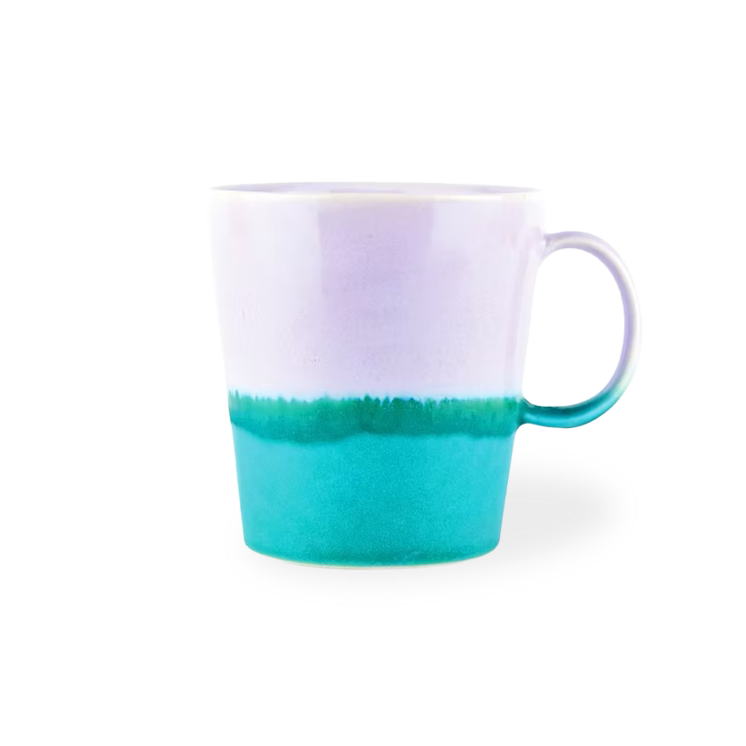 Mug with gradient design from white to teal on a white background