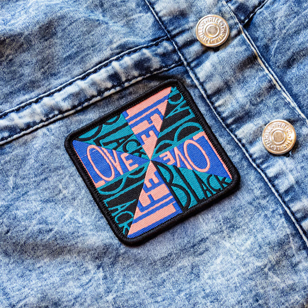 Love Black Life Iron-on Patch by Faith Ringgold