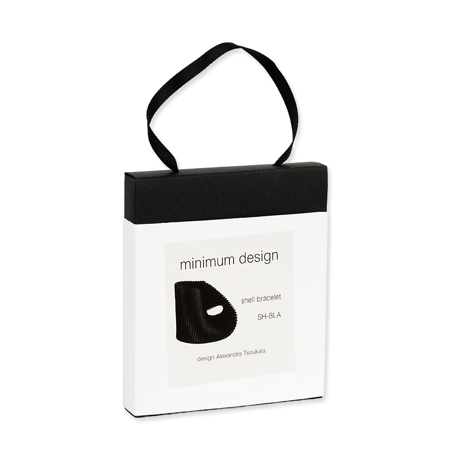Black shell bracelet in a 'minimum design' packaging box on a white background