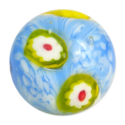 Decorative glass marble with blue, green, and white swirls on a white background