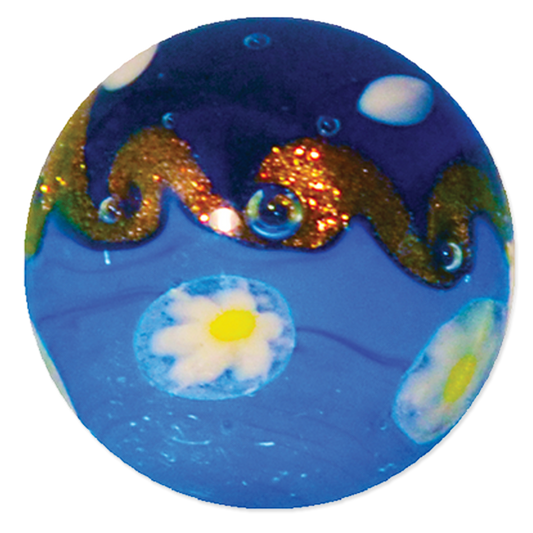 Round blue marble with floral design and glittery elements on a white background