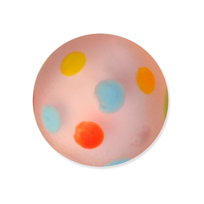 Round glass marble with colorful polka dots on a white background