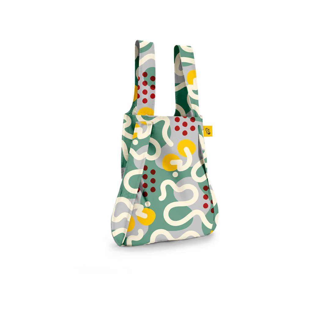 Foldable shopping bag with a colorful pattern on a white background