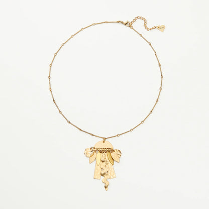 Golden brass necklace with a pendant of abstract shapes suspended from a semi-circle.