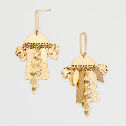 Pair of golden 'Dawn' earrings with abstract shapes hanging from semi-circles.