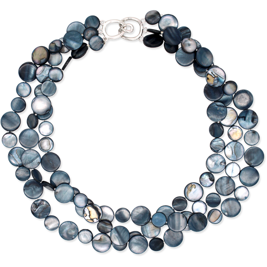 Multistrand necklace with blue and white beads on a white background