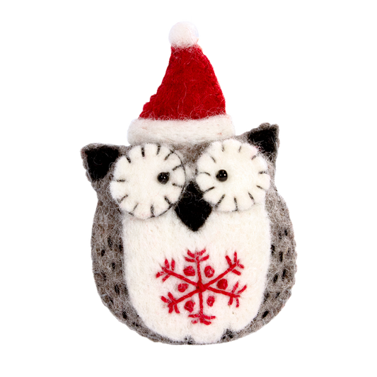 Felted owl ornament with red snowflake design and Santa hat on a white background