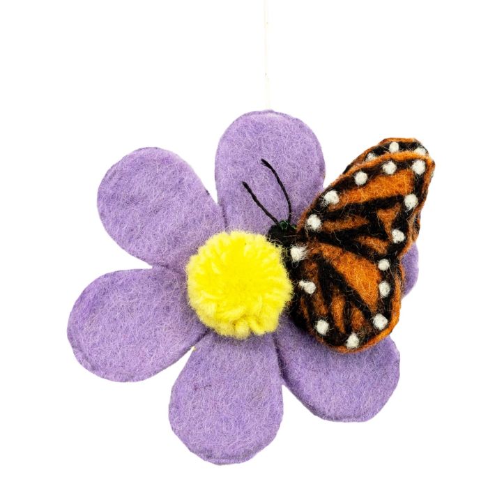 Adorno de flor de mariposa de lana hecho a mano