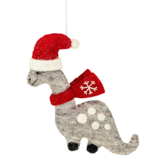 Felt dinosaur ornament wearing a red Santa hat and scarf on a white background