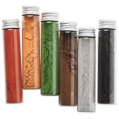 Set of six cylindrical containers with metallic lids, each filled with a different colored powder on a white background.