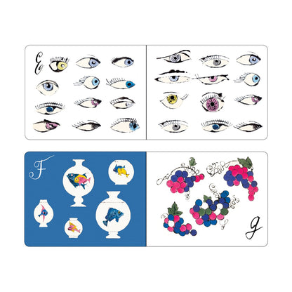 Sheet of temporary tattoos with various designs including eyes and fishbowl with fish.