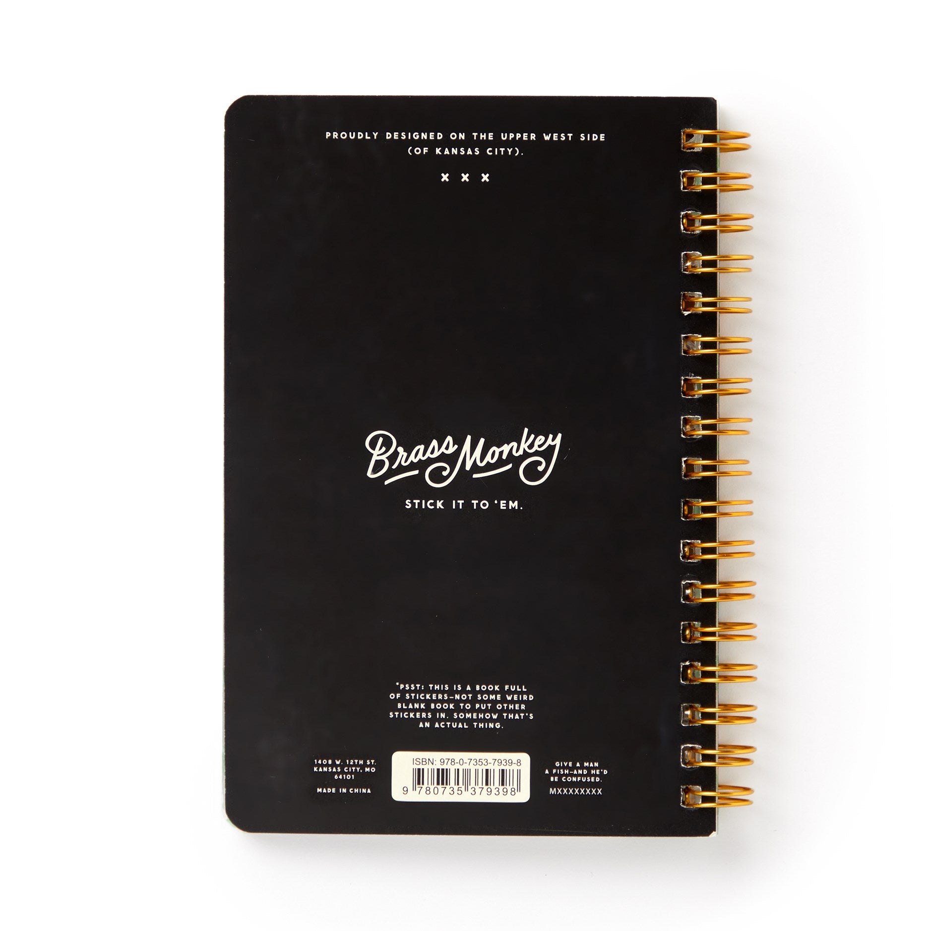 Black notebook with gold spiral binding and 'Brass Monkey' branding on a white background