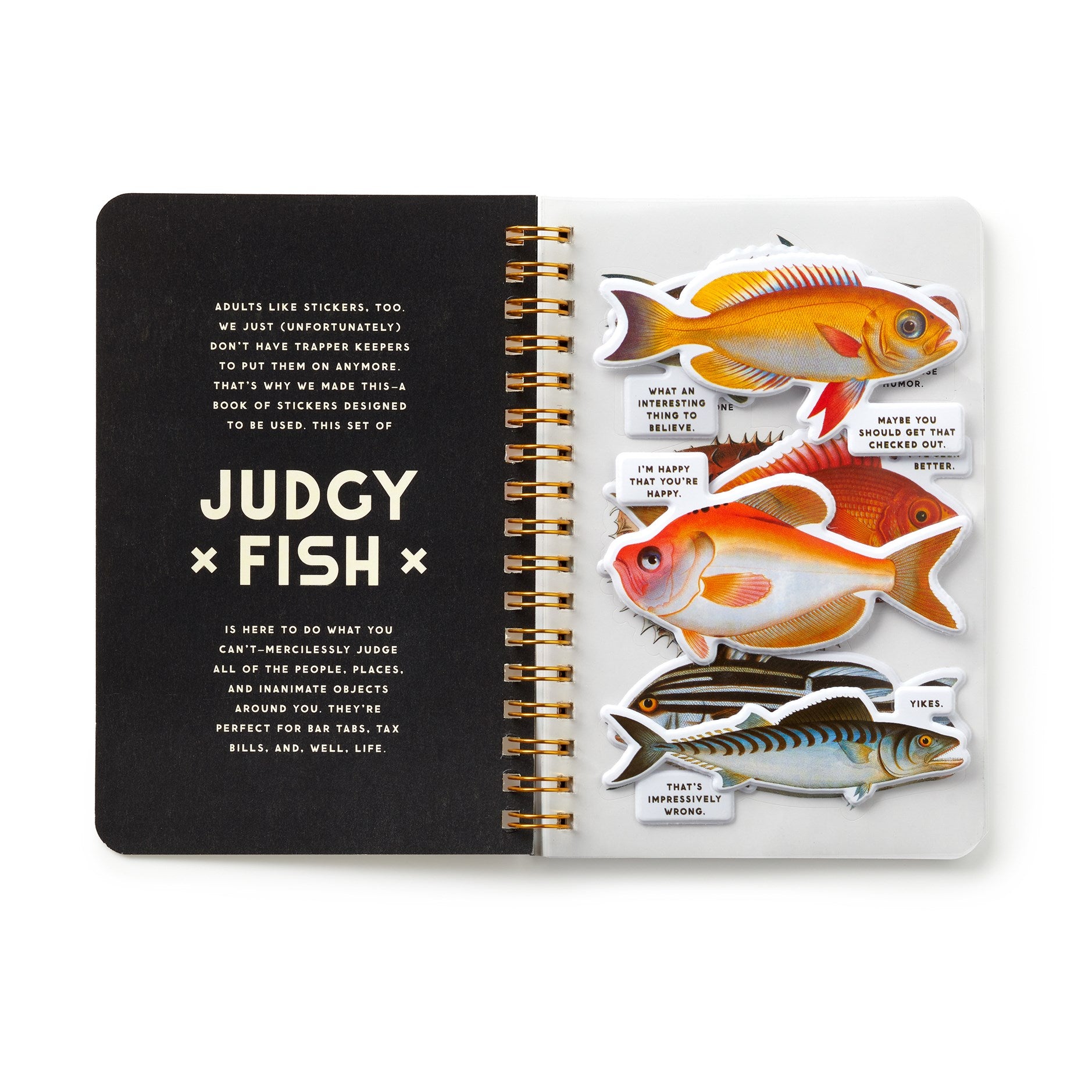 Notebook with fish-themed stickers on a white background