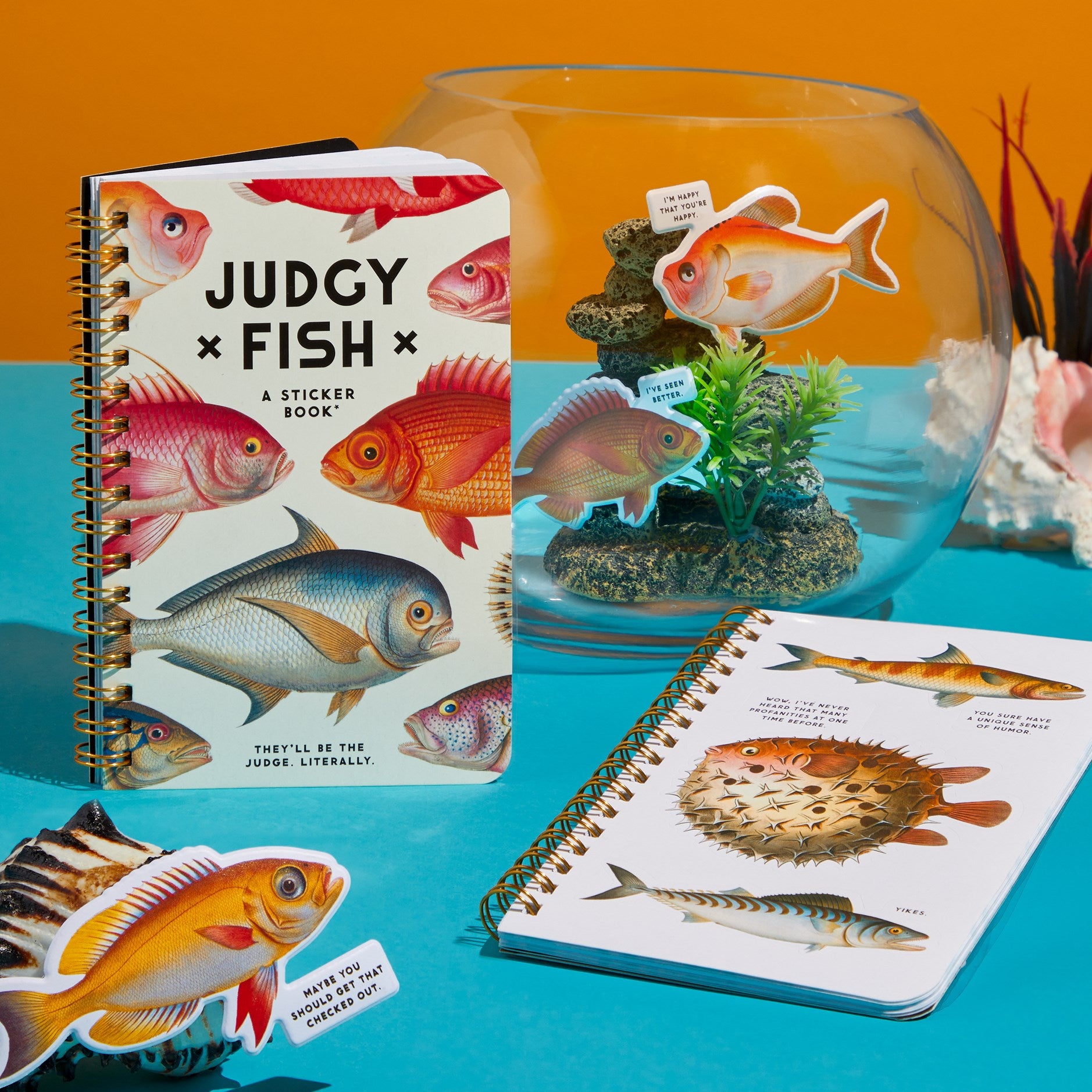 Sticker book titled 'Judy x Fish' with fish illustrations and a small fishbowl on a colorful background.