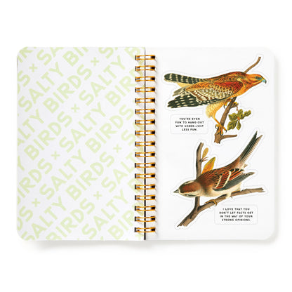 Notebook with bird illustrations and text on a white background
