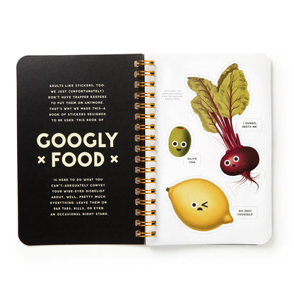 Open notebook with illustrations of vegetables and text on a white background