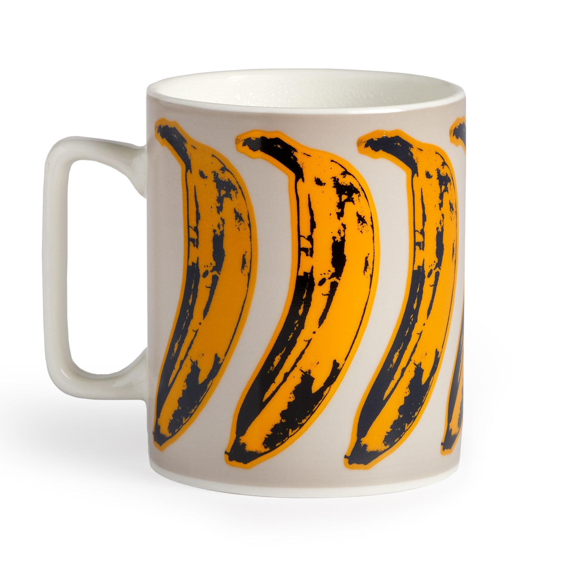 White mug with yellow banana illustrations on a white background