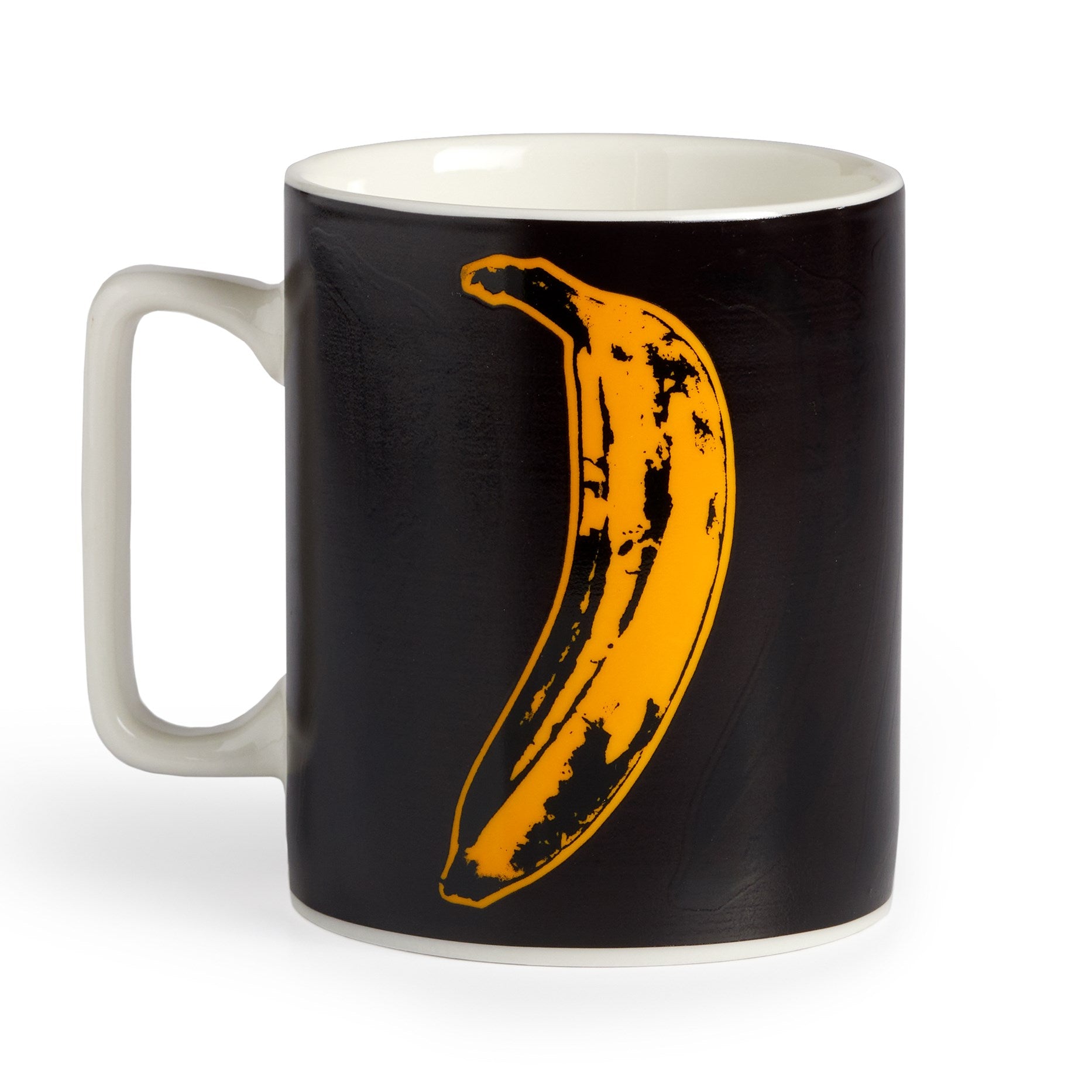 Black mug with a yellow banana design on a white background
