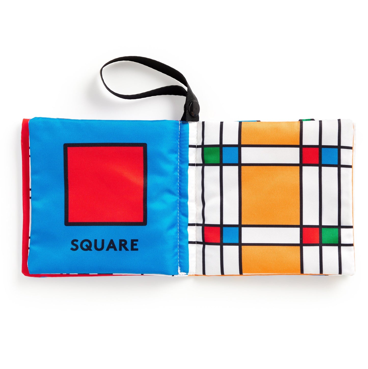 Fabric book pages with geometric designs on a white background