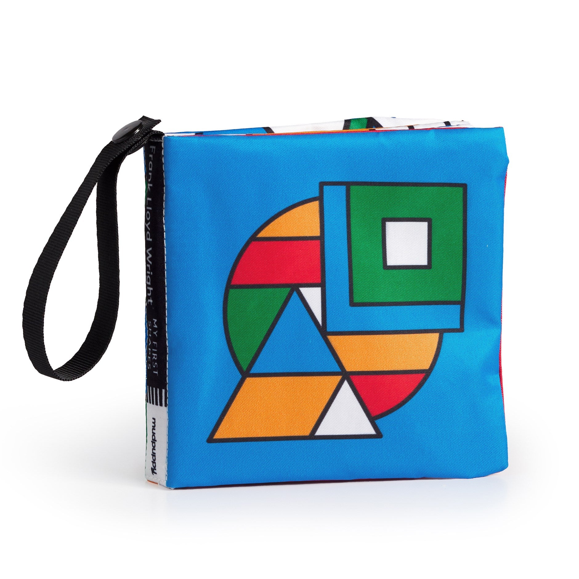 Colorful geometric patterned fabric book with a strap on a white background