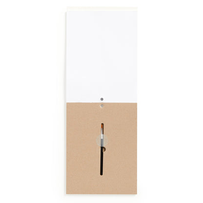 White envelope with a brown flap featuring a brush on a white background