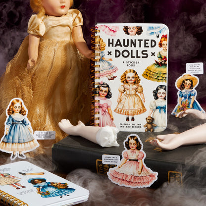 Sticker book titled 'Haunted Dolls' with vintage-style dolls and a doll in a yellow dress.