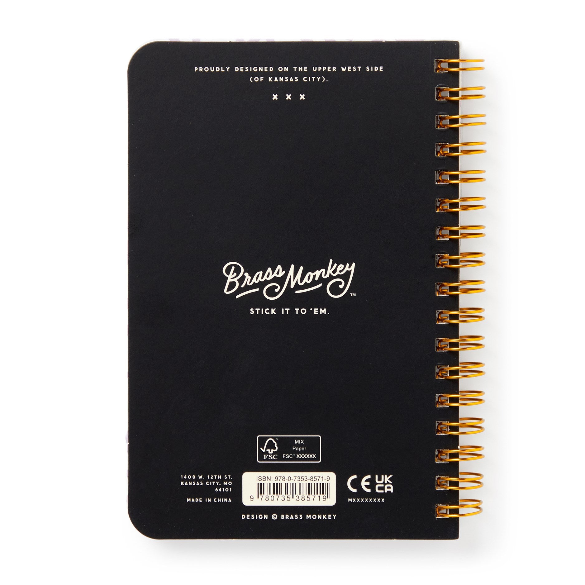Black notebook with gold spiral binding and 'Brass Monkey' branding on a white background