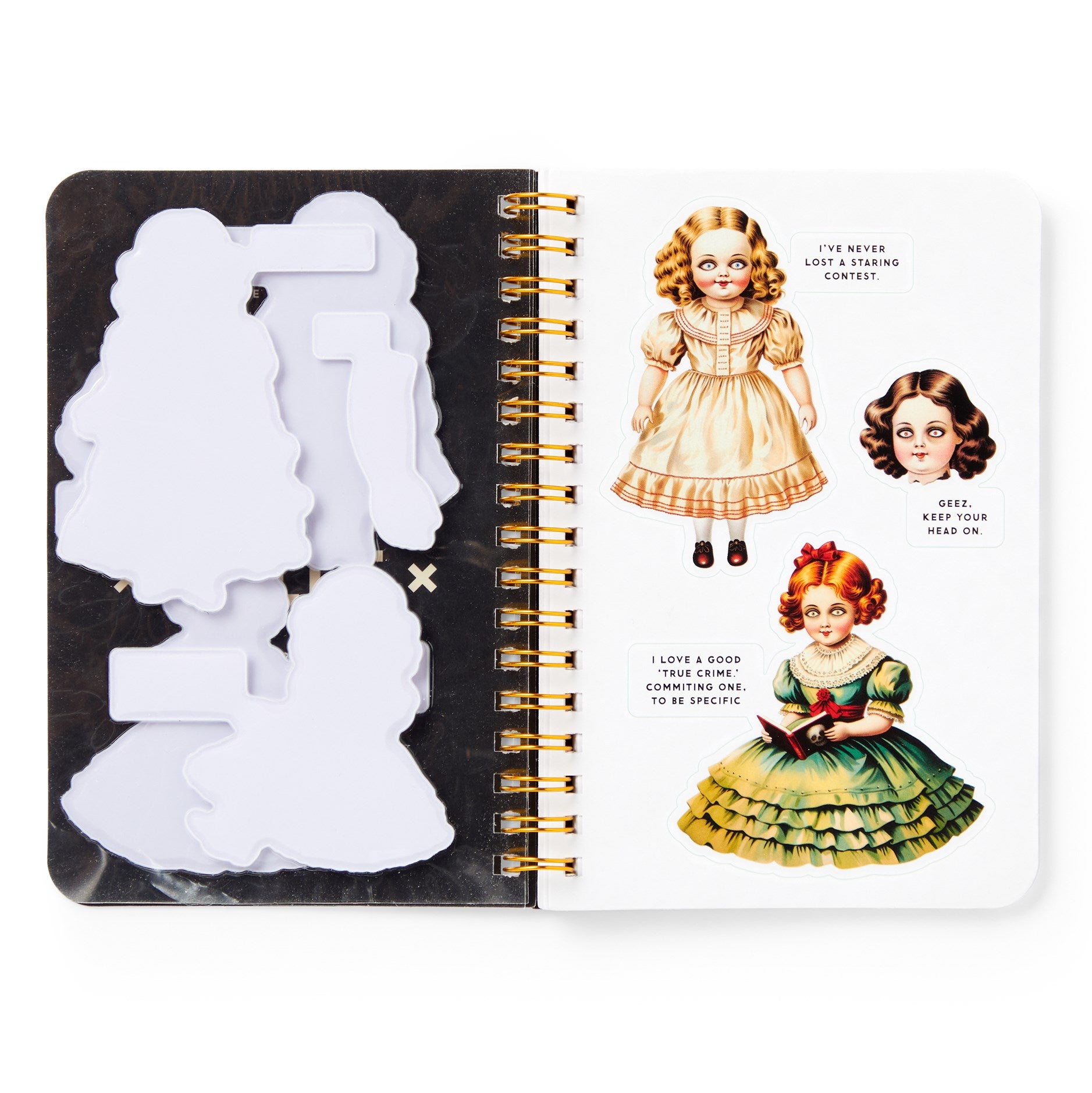 Notebook with vintage-style doll illustrations on a white background