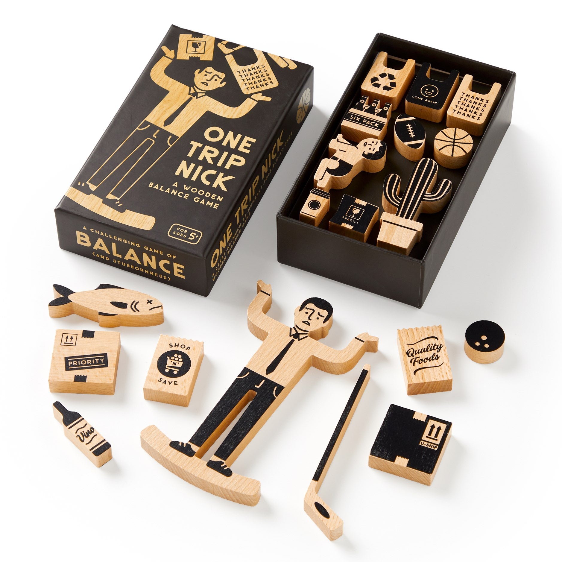 Wooden balance game set with packaging on a white background