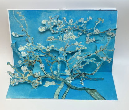 Pop-up card with floral design on a blue background
