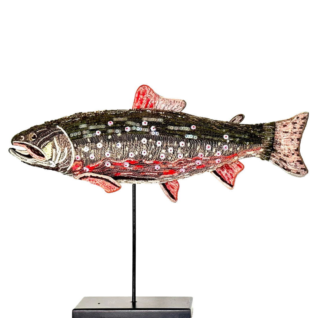 Decorative fish sculpture with sequins on a white background