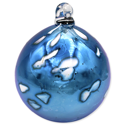 Blue glass ornament with white design
