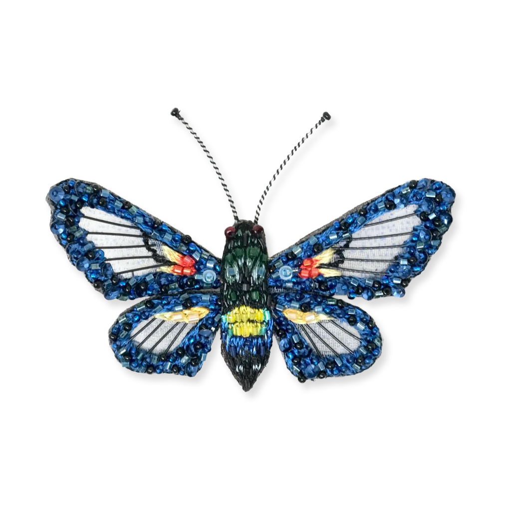 Butterfly-shaped object with blue and multicolored wings on a white background