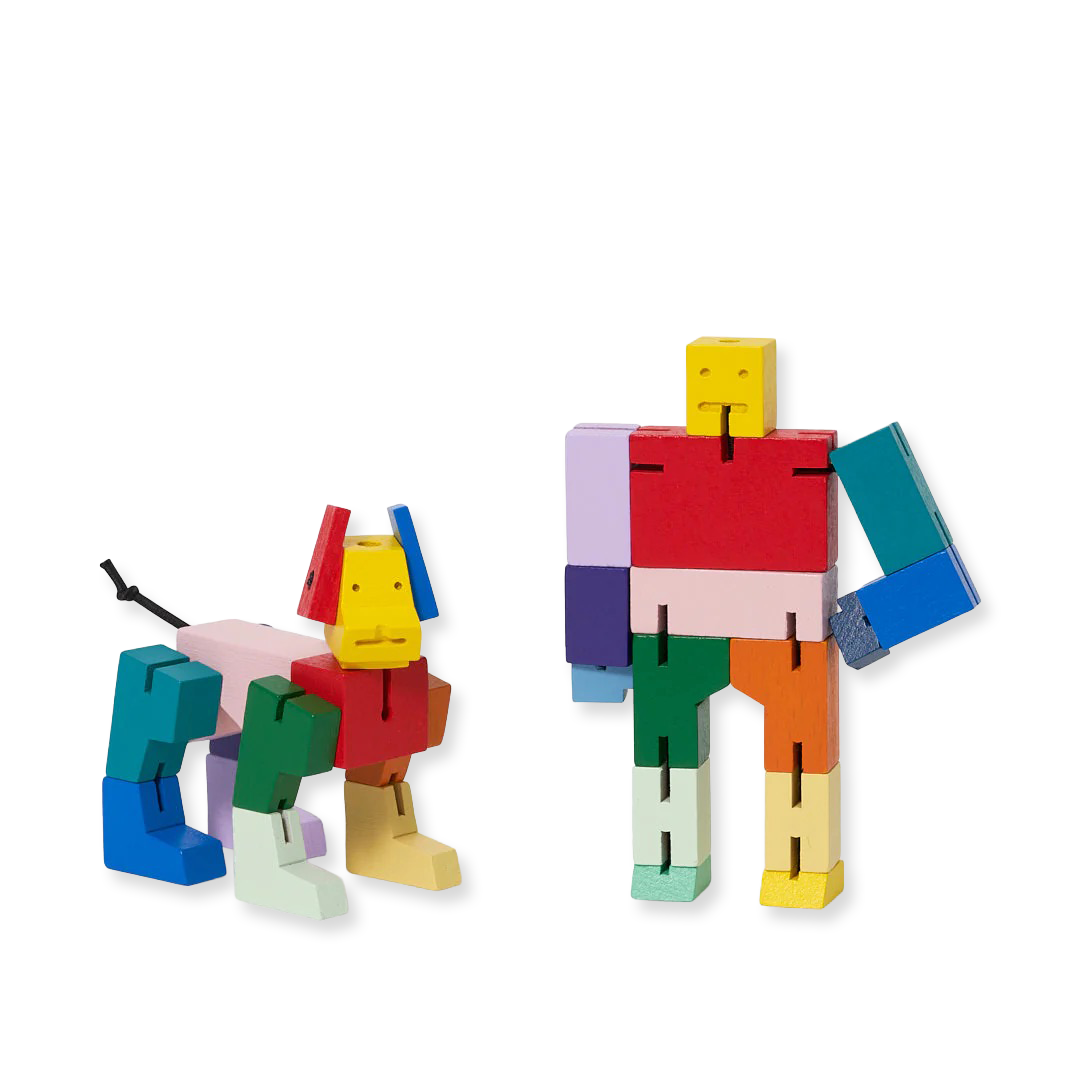 Colorful toy figures made of interlocking blocks on a white background