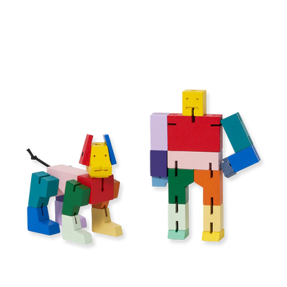 Colorful toy figures made of interlocking blocks on a white background