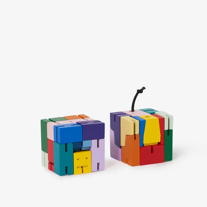 Two colorful puzzle blocks on a white background