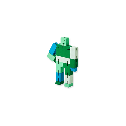 Toy figure with a gradient green and blue design on a white background