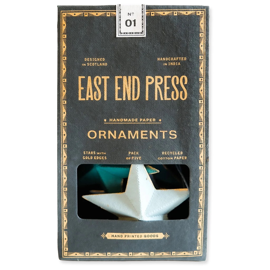 Packaging of East End Press ornaments with a star-shaped product inside.