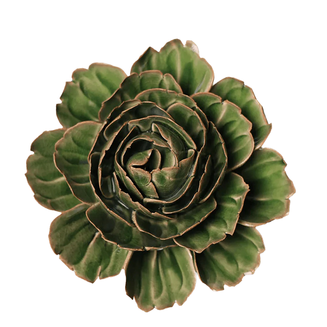 Green ceramic flower on a white background