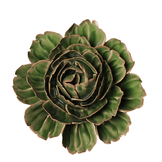 Green ceramic flower on a white background