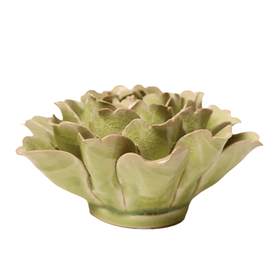Green ceramic artichoke-shaped flower on a white background