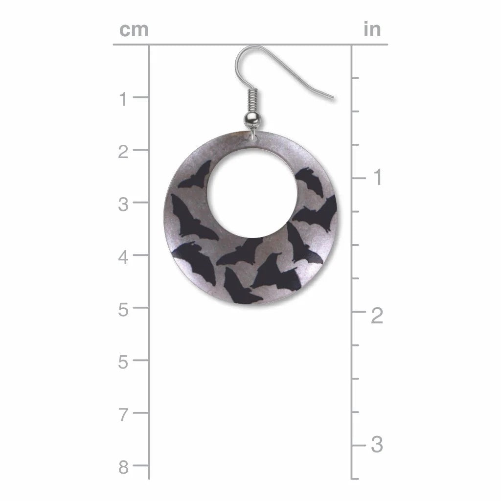 Earring with bat pattern on a circular design, shown with measurements on a white background.