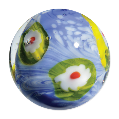 Decorative glass marble with floral designs on a white background