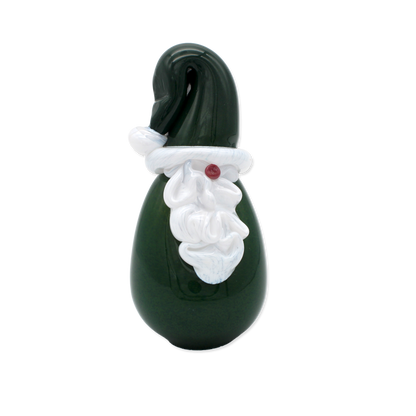 Green glass ornament shaped like a gnome with white details on a white background