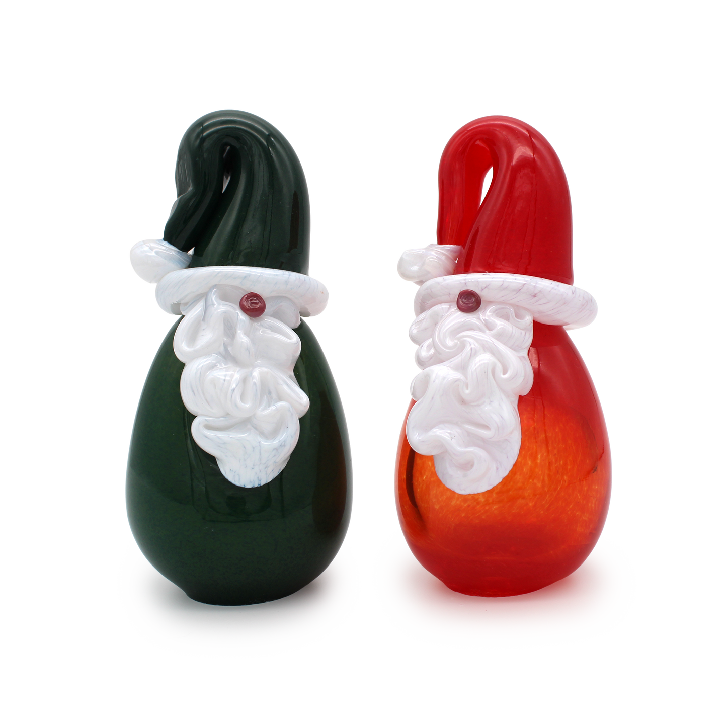 Two glass figurines shaped like Santa Claus on a white background